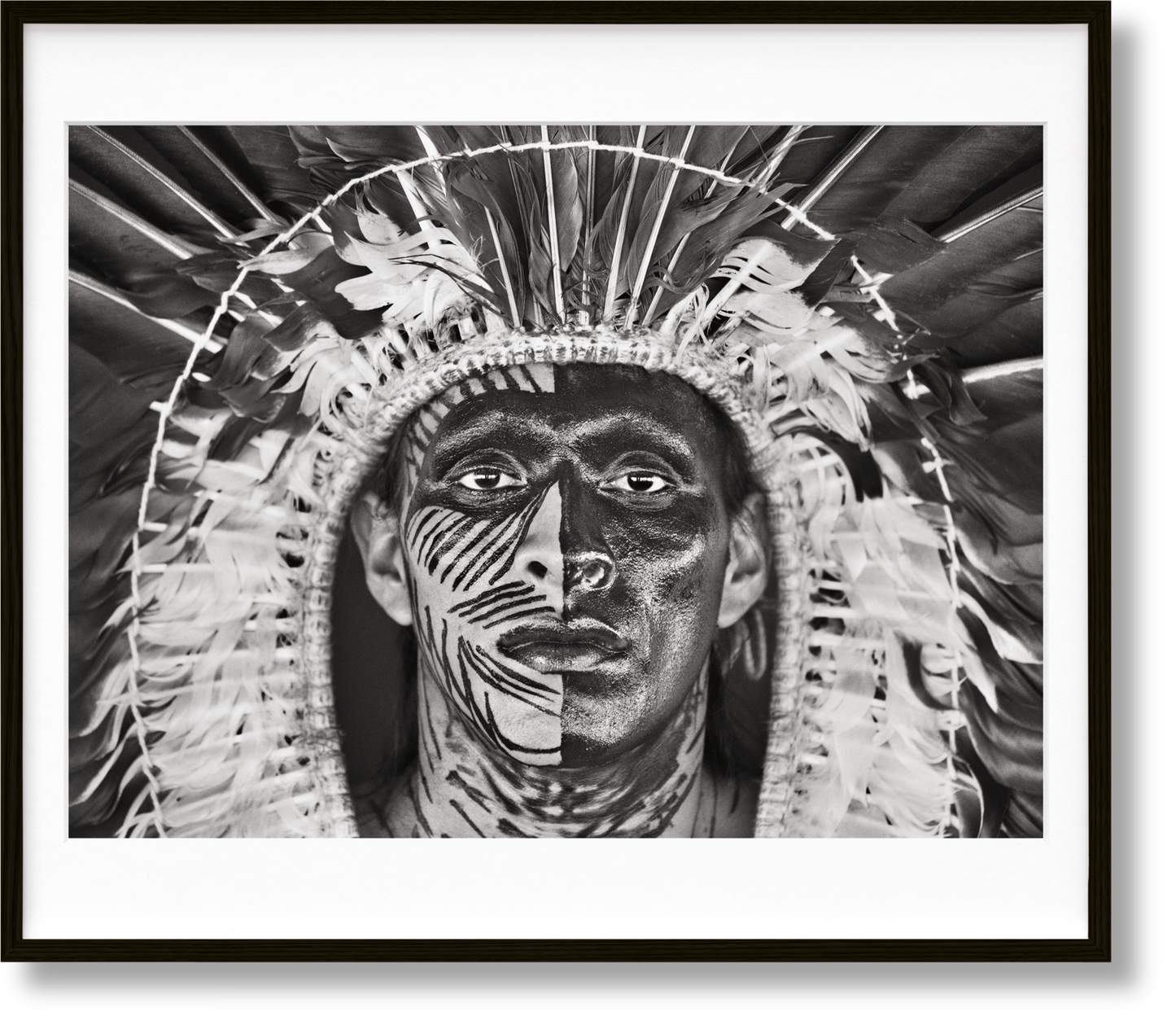 Sebastião Salgado. Amazônia, Art Edition No. 1–100 ‘Adão Yawanawá in a headdress of eagle feathers’ (English)